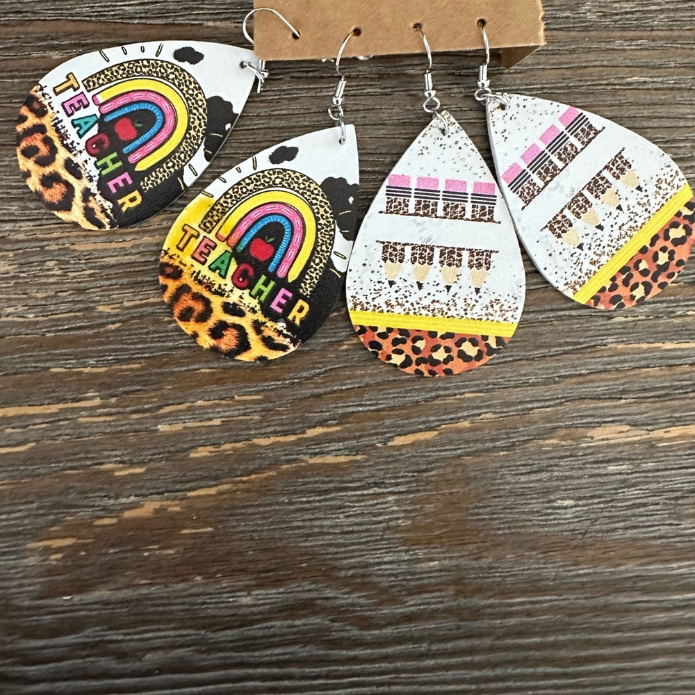 NEVER WORN TEACHER EARRINGS